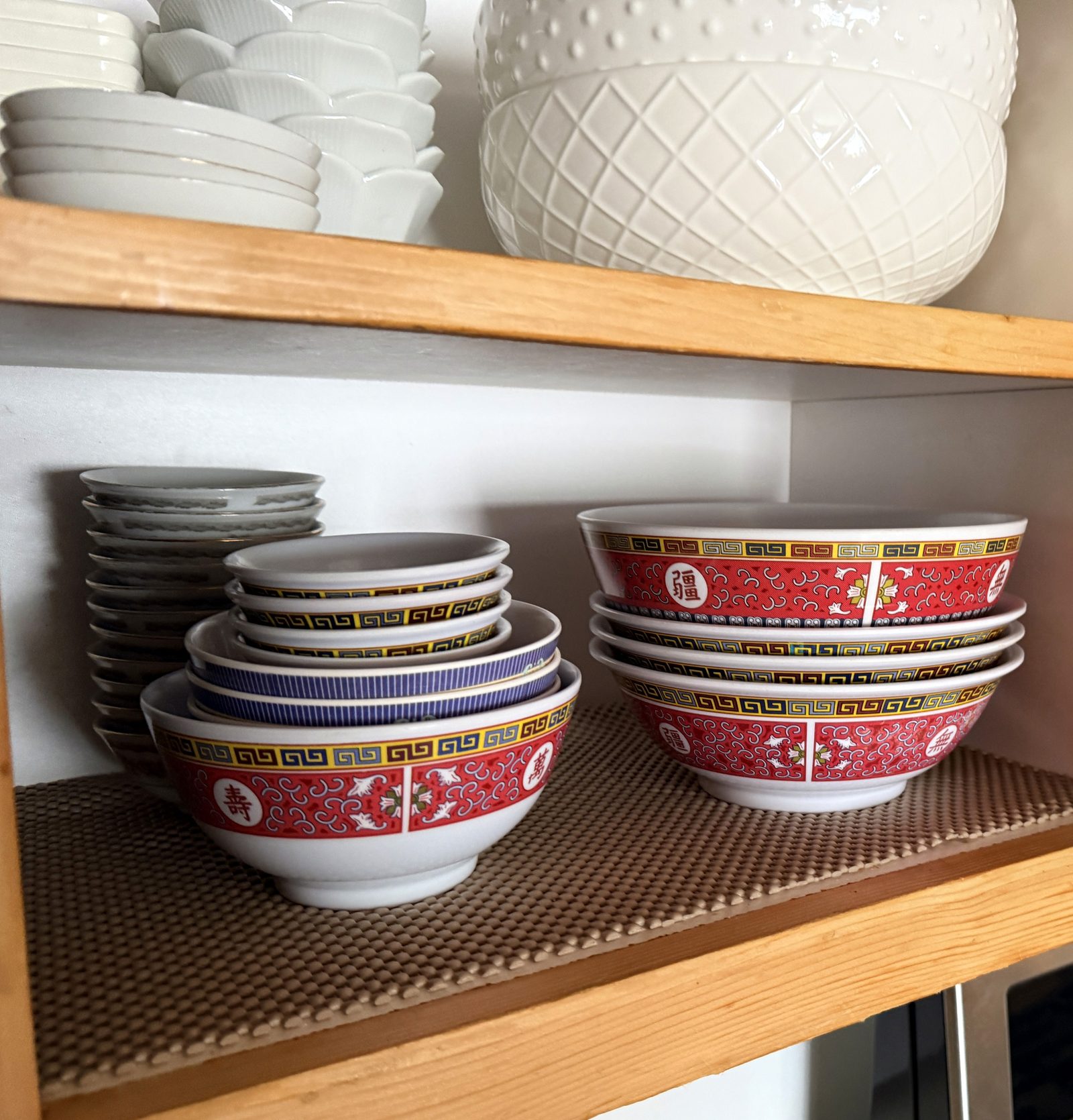 Beefy Bowls stacked in a kitchen cabinet